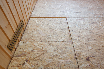 OSB boards (flakeboards) laid on floor