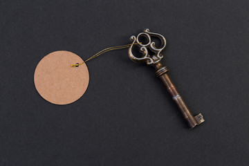 Old vintage key with tag or label