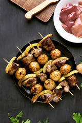 Bbq chicken liver and vegetables skewers