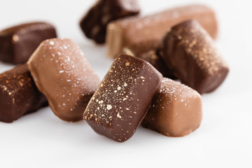 Luxury handmade bonbons on white background