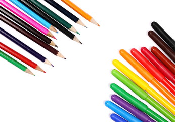 Colorful felt pen markers and pencils  isolated on white background, top view
