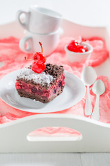 Homemade chocolate cake with cherry and crumble
