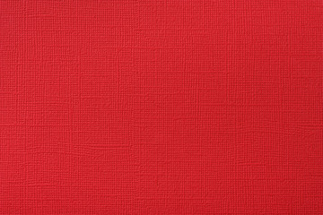 Red embossed paper texture. Abstract background.