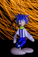 Wooden puppet of little boy