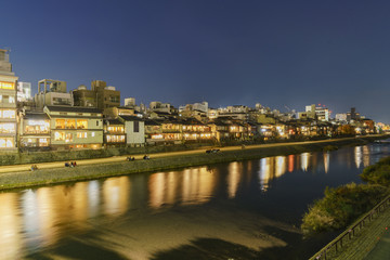Fototapeta na wymiar Night view with modern building around Kamo River