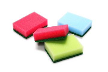 Colorful sponges isolated on white background
