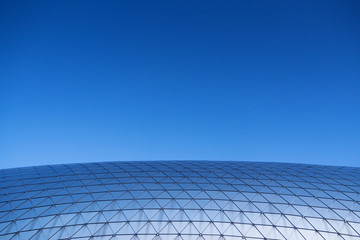 architect of modern building with blue sky background.