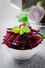 Fresh beetroot in a bowl, preparing beetroot salad. Selective focus, copy space, close up.