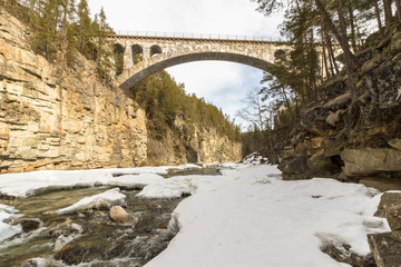 The old train bridge, Jora bridge, crossing the Jora river in Dombaas, Norway