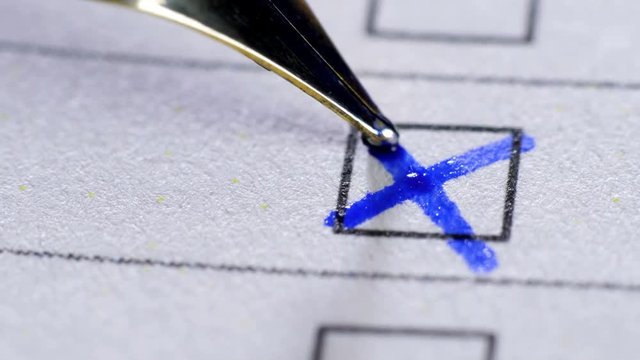 Fill in a form questionnaire. Fountain pen. Extreme close up.
