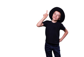 boy in black hat shows a finger on a white background