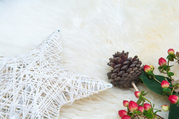 Festive christmas decorations arranged over a white background