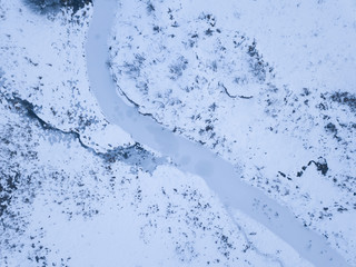 Small frozen river. Aerial view landscape