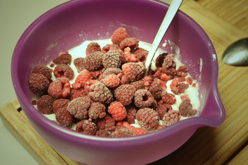 Bowl with raspberry and yoghurt