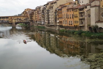 Fototapeta na wymiar Reflection in the Arno river, Florence Firenze, Italy