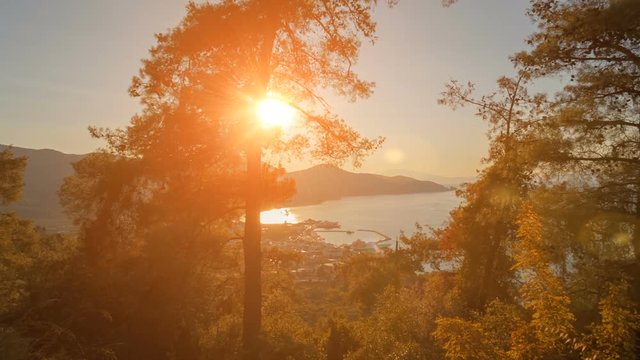 Golden hour sunset, contre-jour shot of Limenas, in the island of Thassos, Greece in the North Aegean Sea, the northernmost Greek island.  Thasos is the northernmost Greek island, and 12th largest one