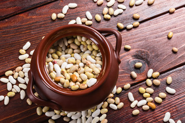 Dried beans on a wooden table