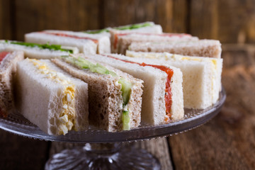 English tea sandwiches on cake stand - 183942864