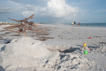 Rustic sand art on beach