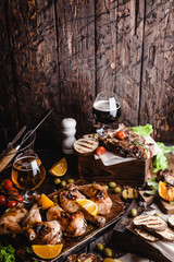 delicious grilled meat with vegetables and beer
