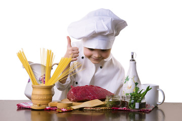 funny boy chef cooks beef meat