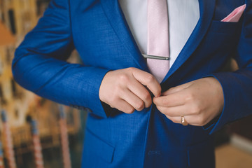suit dressing groom