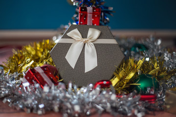 Christmas decorations on Christmas tree, gifts from the Santa Claus, holidays are coming