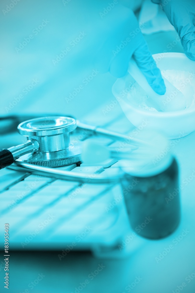 Poster composite image of close-up of keyboard with stethoscope