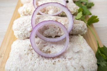raw chicken cutlets