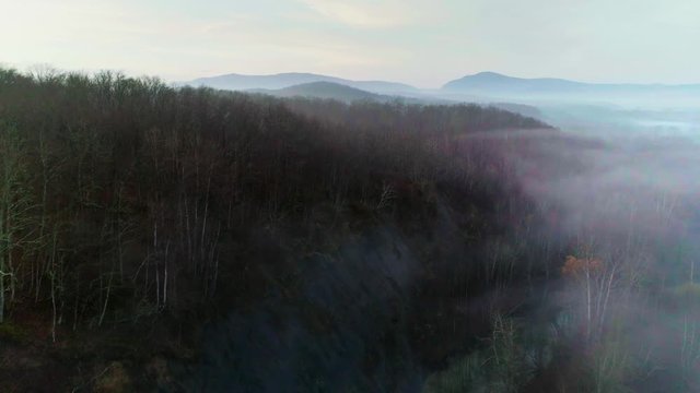 foggy autumn landscape with mountains