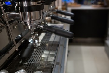 Empty espresso machine at counter
