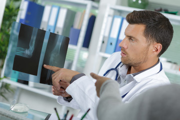 Doctor and patient looking at xray