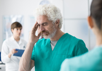 Healthcare worker having an headache