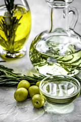 natural oils concept with fresh olives on table background