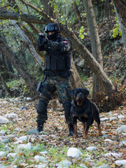 Police officer with his dog on duty