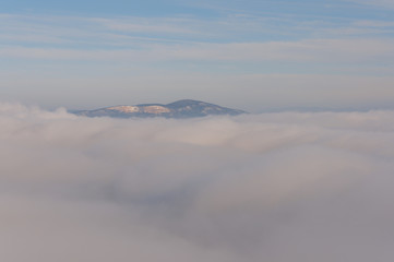 misty frosty snow winter landscape in nature, mist flowing, foggy winter landscape from Julianus tower 