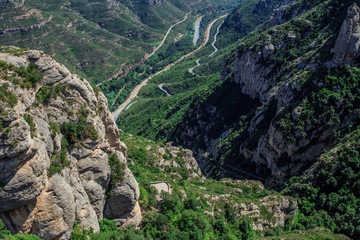 Fototapeta na wymiar The Mountain of Montserrat (Catalonia, Spain). Montserrat mountains and Benedictine monastery of Santa Maria de Montserrat.