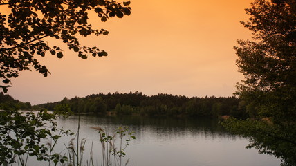 Obraz premium Lake with Red Cloud