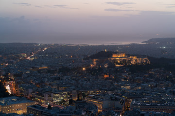 view of Athens and the Acropolis from the Mount Lycabettus at dusk