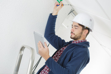 builder checking on tablet how to fix ceiling