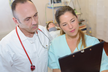 doctor and nurse with clipboard