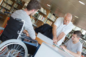 boy in wheelchair in class