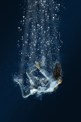 Woman floats underwater. Horrible dream