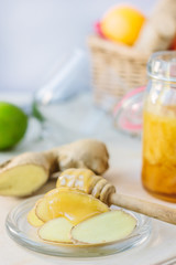 Healthy eating - honey and ginger root slices.