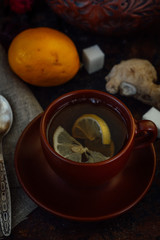 Ginger tea with lemon, lime and sugar.
