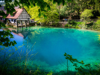 view on the well "Blautopf" in Blaubeuren, Germany