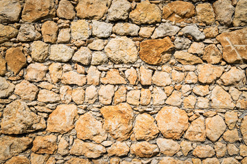 Wall of yellow stones.