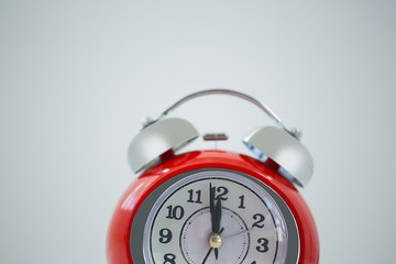 Clock hands reaching 12 clock midnight on new year 2018