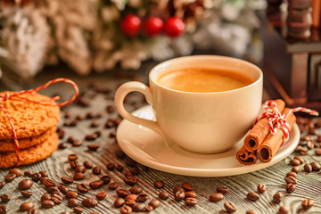 Obraz na płótnie Canvas Cozy winter setting with cup of coffee