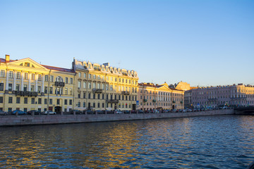 Naklejka premium Embankment of Fontanka river in the autumn in the rays of light in Saint Petersburg